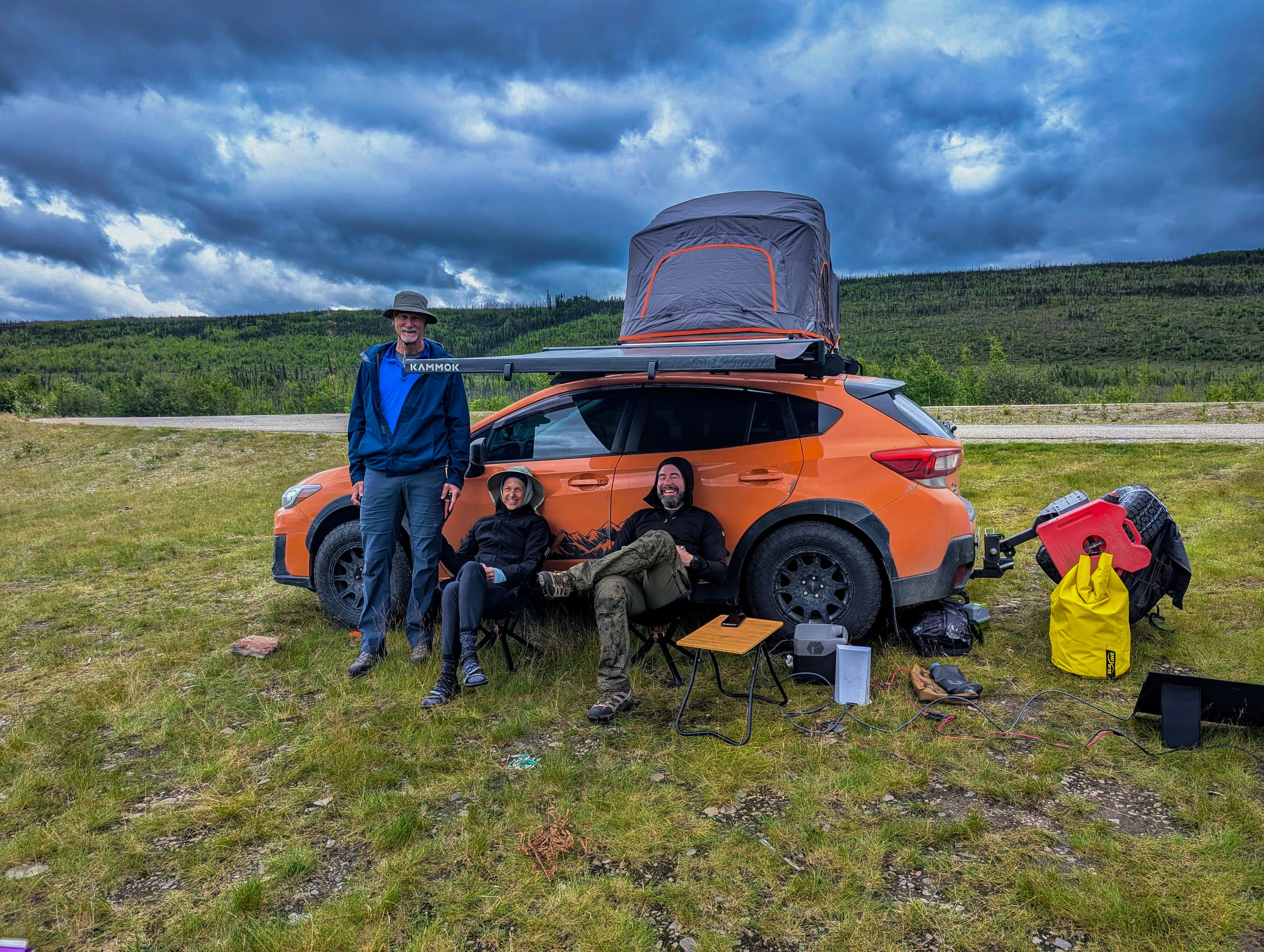 Road trip crew with rooftop tent in Alaska