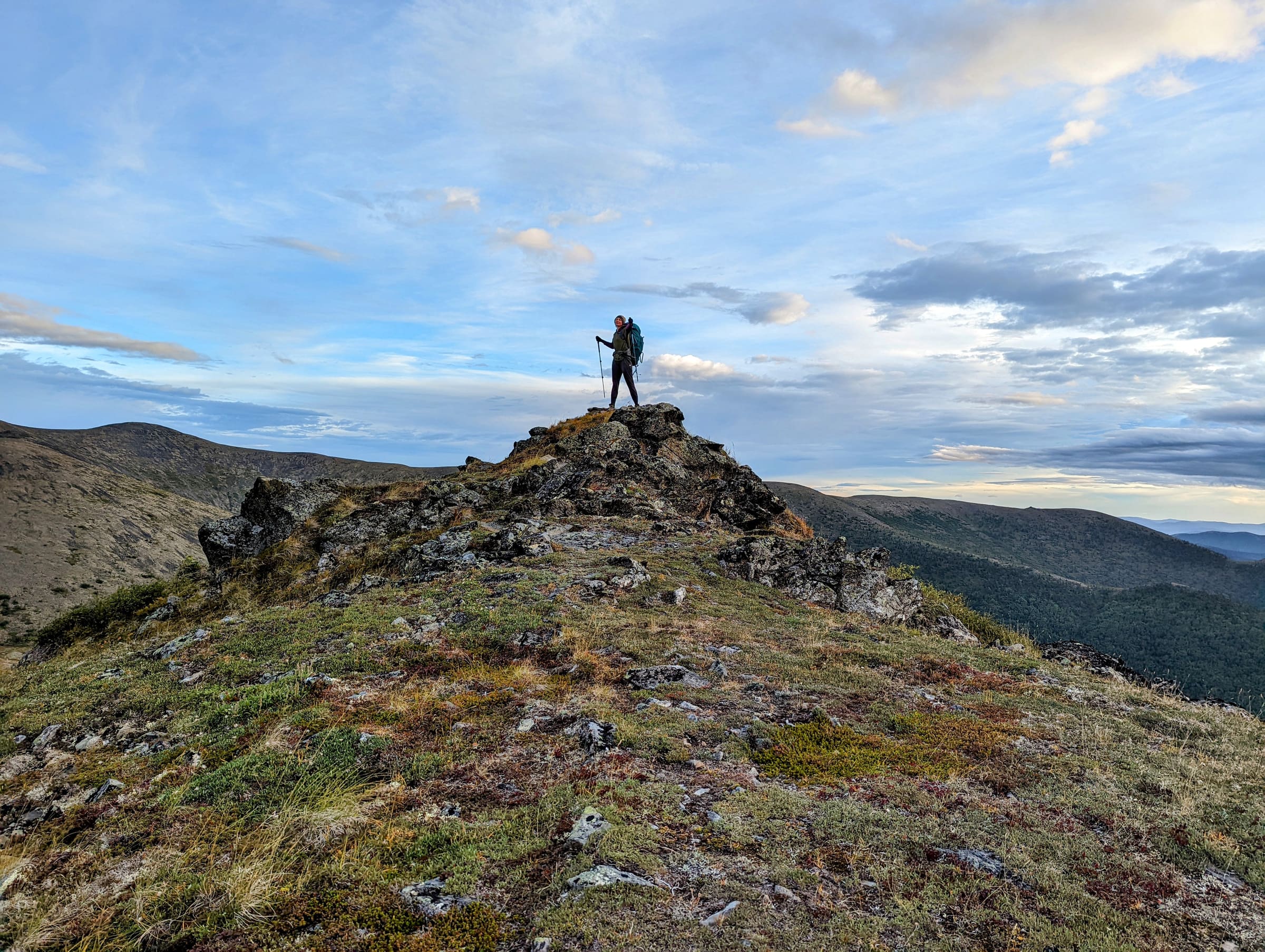 Hiker on Alaska mountain summit